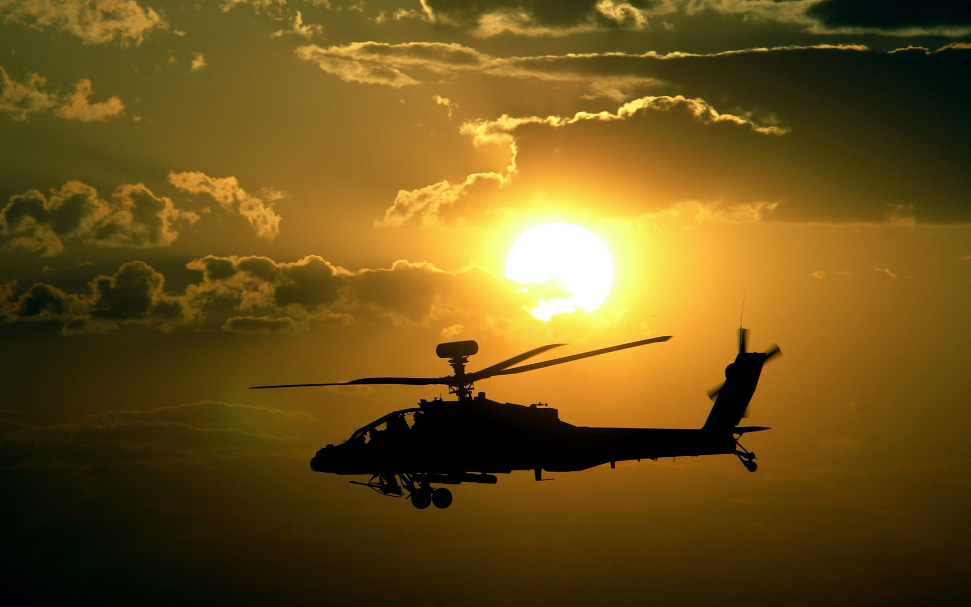 Apache helicopter sunset