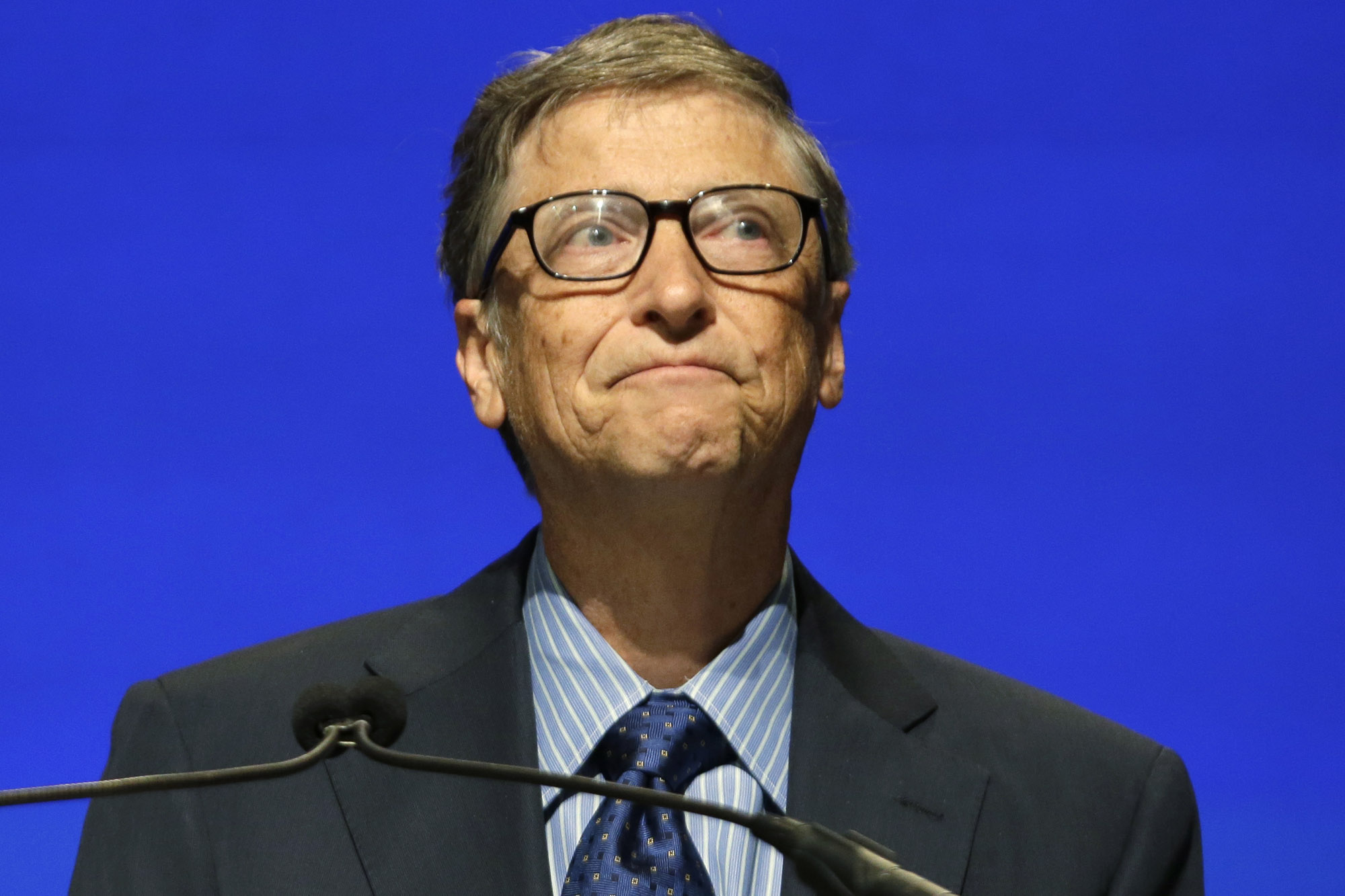 Microsoft chairman Bill Gates chokes up as he end his remarks at the company's annual shareholders meeting Tuesday, Nov. 19, 2013, in Redmond, Wash.