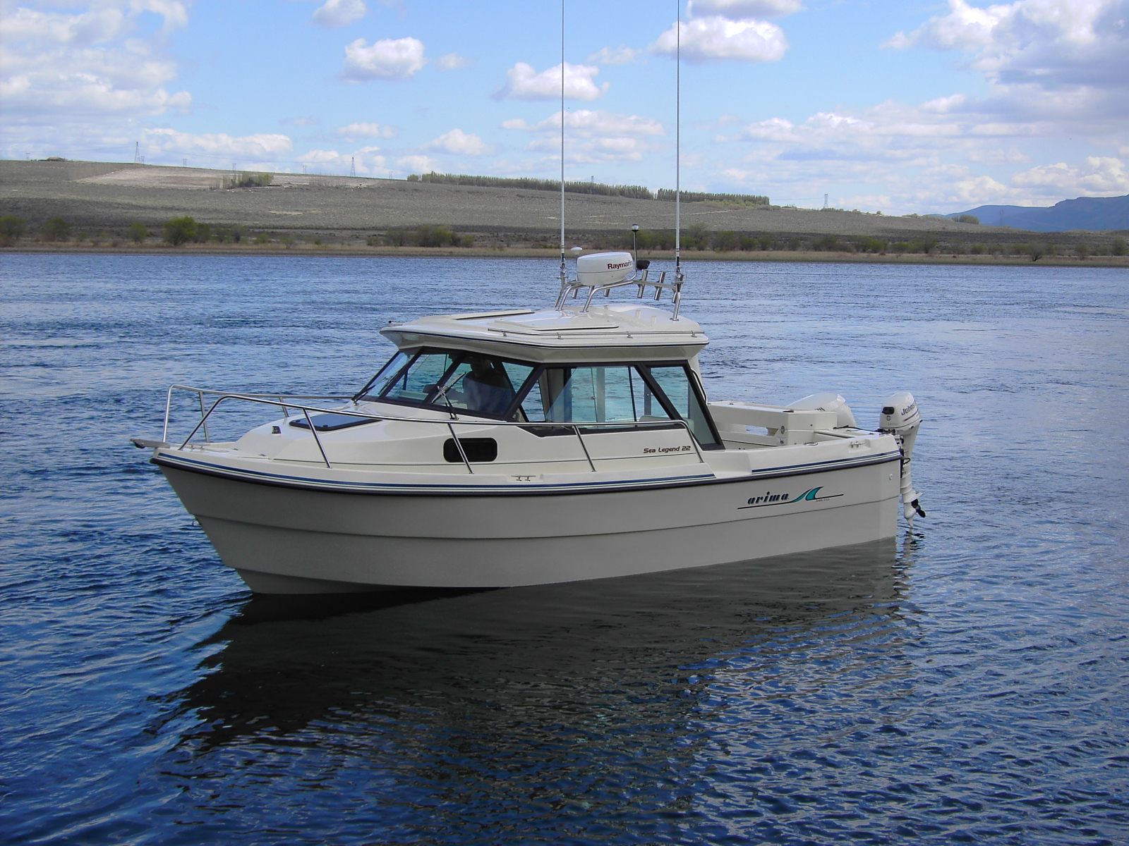 22' Arima Sea Legend Hard Top is a very open space oriented cabin boat. With the cabin construction designed to provide comfort for the fisherman and to ...
