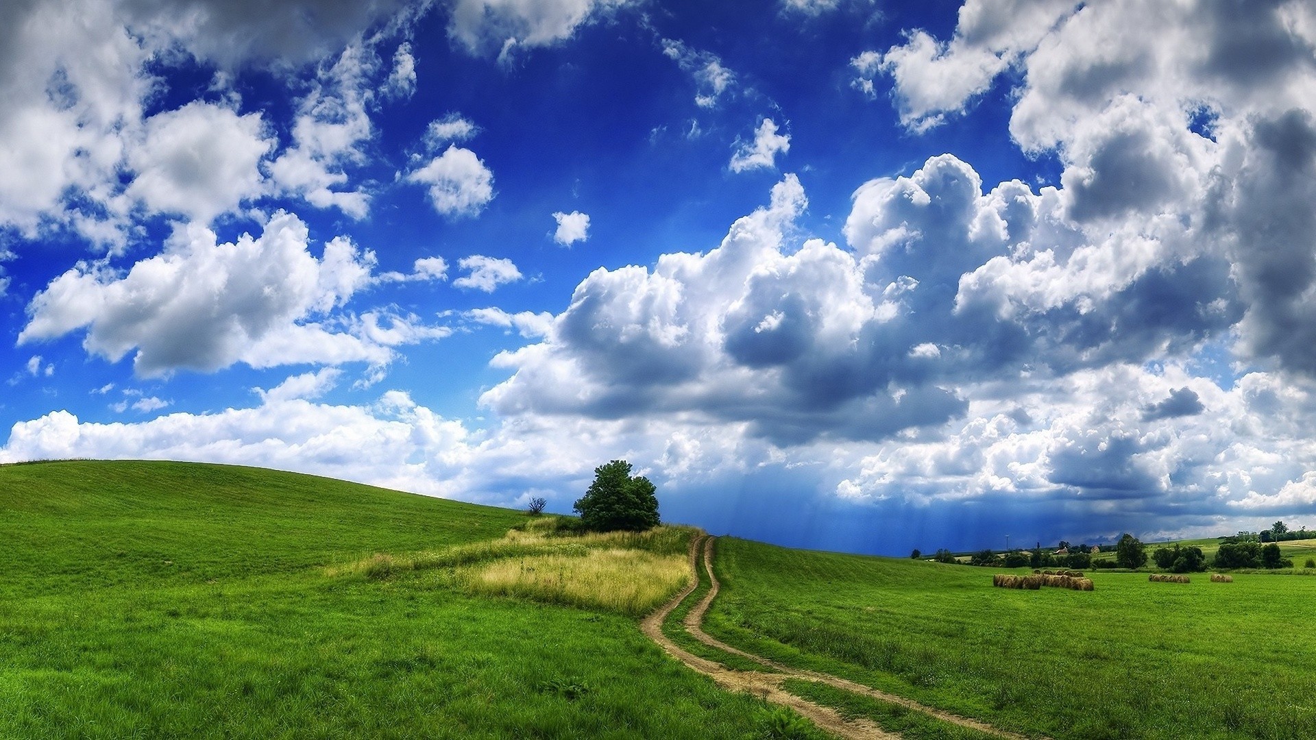 Cloudy sky over the hill wallpaper