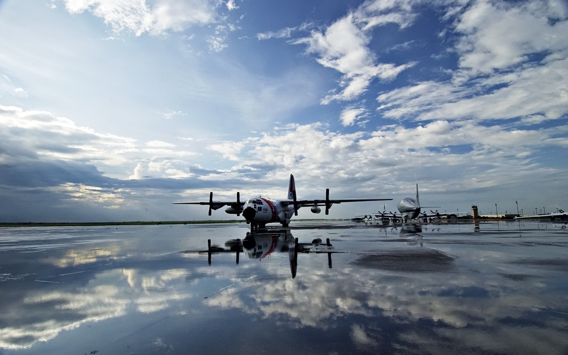 C-130 Hercules aircraft coast guard reflections