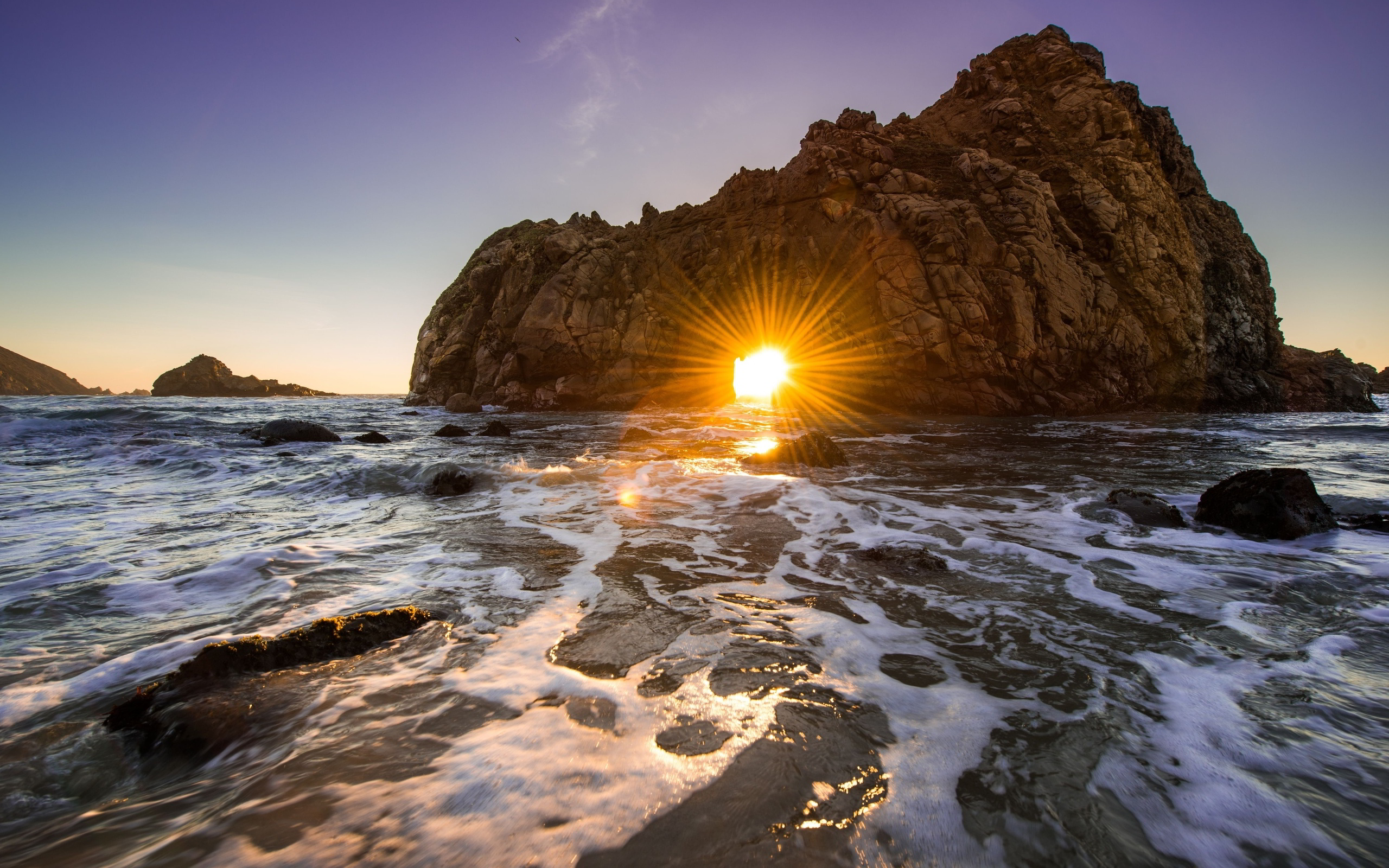 Coast sunset rock hole