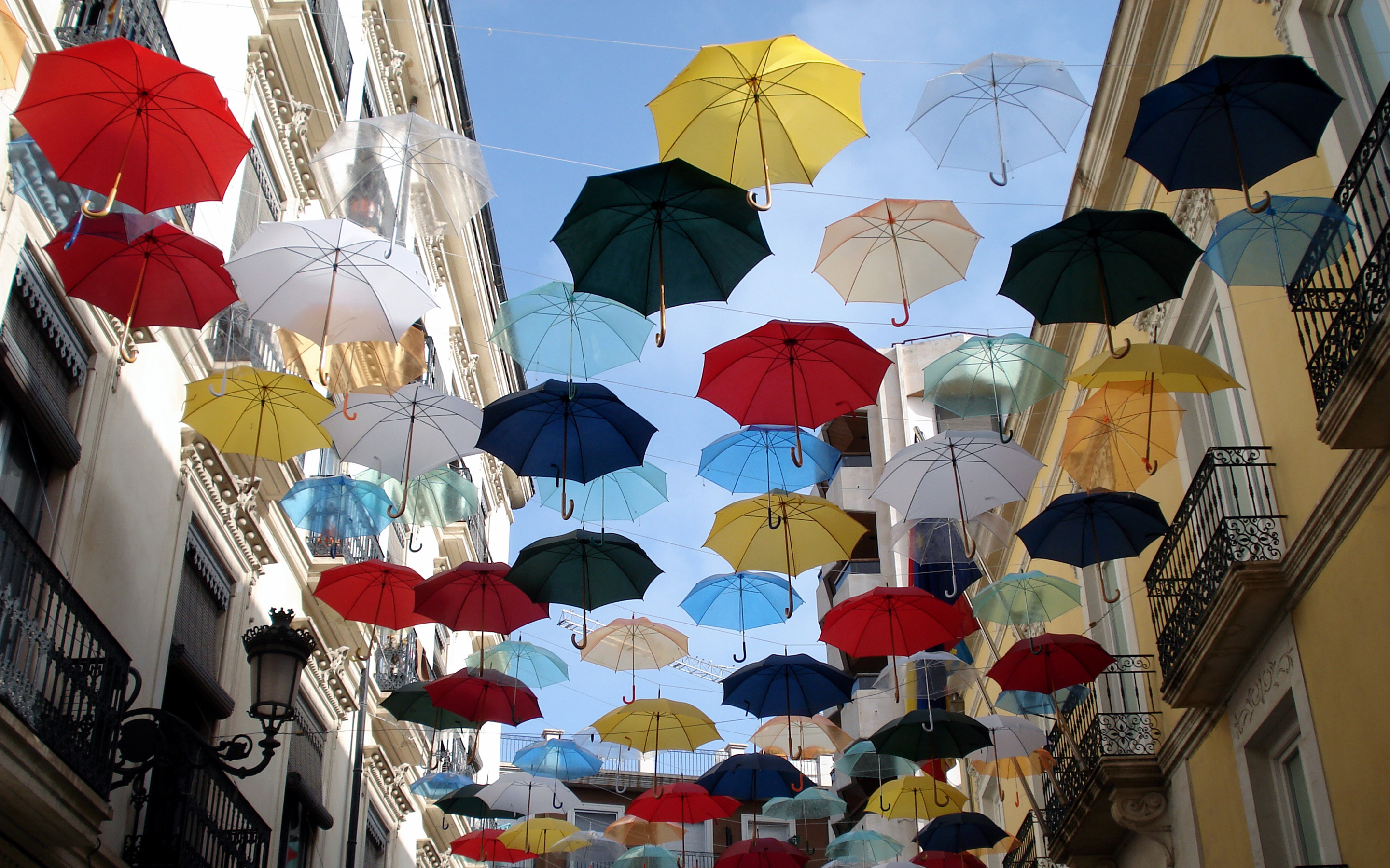 Colorful umbrellas city street