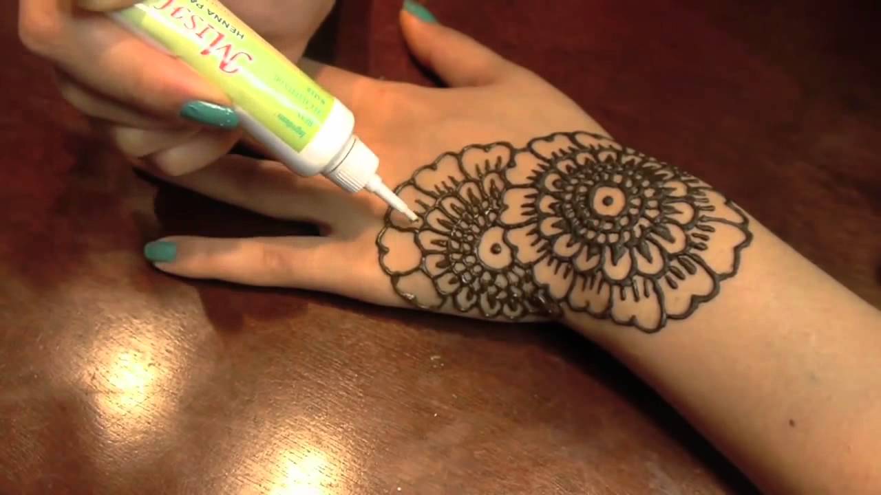 music from promise phan's "henna tattoo tutorial"