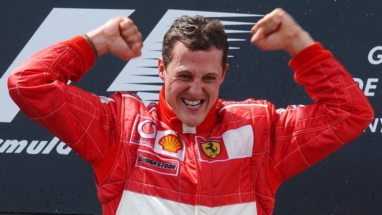 Michael Schumacher celebrates another win for Ferrari in 2002