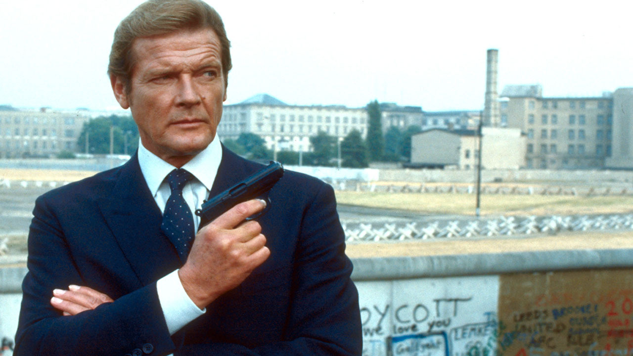 Yes, that's Roger Moore as James bond in the 1980s, but his shirt is timeless. Nice, moderate, crisp spread collar sitting high up his neck. Perfect.