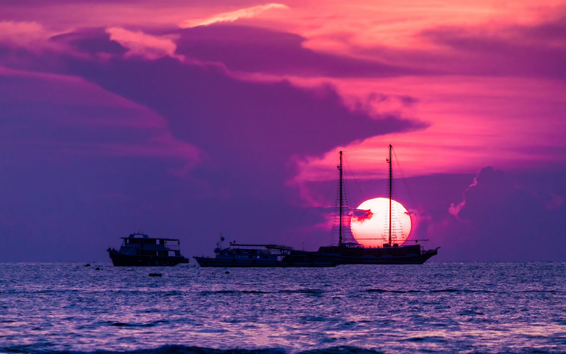 Ships in sunset