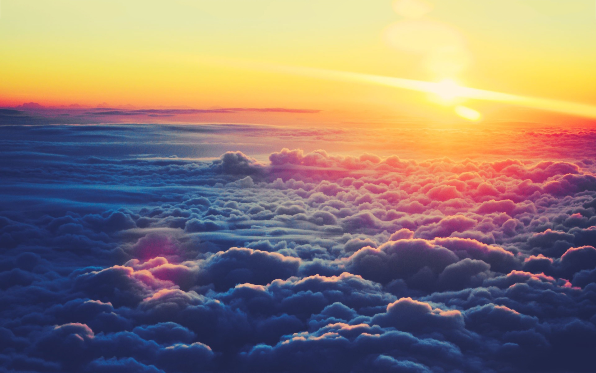 Sunset over clouds