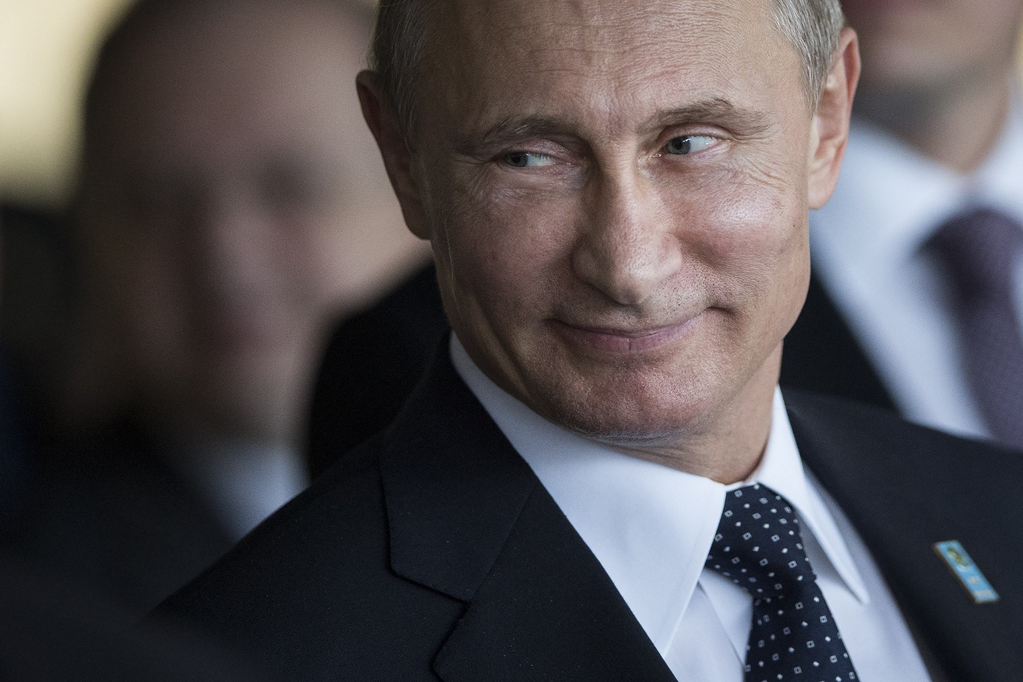 Above—Vladimir Putin. AP photo. At top—an anti-Putin protest in St. Petersburg in 2012. The sign in Russian on the left reads, “Not another term in ...