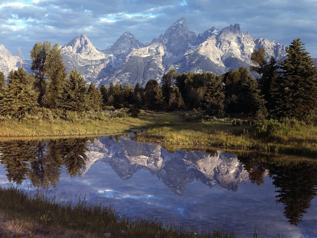 The amazingly beautiful Grand Teton reflecting in a lake that is close to where there has