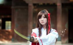 Beauty Asian Girl With Samurai Sword