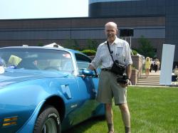 Bill Porter with the finished car at the 2002 Eyes on Design Show on the Chrysler Headquarters campus.