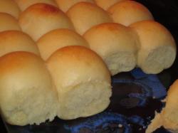 Makes 24 yummy rolls. The rolls will be baked in a 9 x 13 pan. The roll are easy to make but if you have a bread machine it can be even easier.
