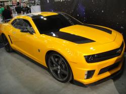 Bumblebee depicted as a 1975 Camaro and four different iterations of a fifth-generation Camaro with the below version being the production version that ...