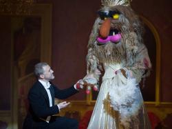 Christoph Waltz, waltzing with Sweetums in Muppets Most Wanted.