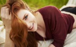 Freckled redhead girl smile