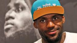 NBA star LeBron James speaks during a promotional event at a shopping district in Hong Kong