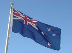 The flag of New Zealand outside the Beehive in Wellington.
