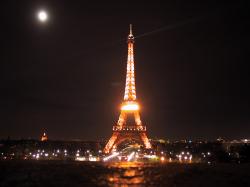 Eiffel tower lights, under moonlight, paris
