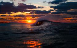 Sea wave sunset