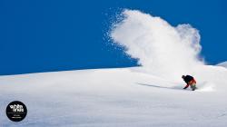 Snowboard Wallpaper - Scotty Lago kicks up a rooster tail in Alaska