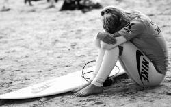 Surfing girl concentrate